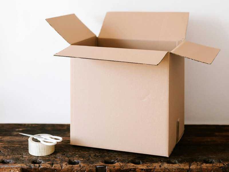 open box with tape and scissors